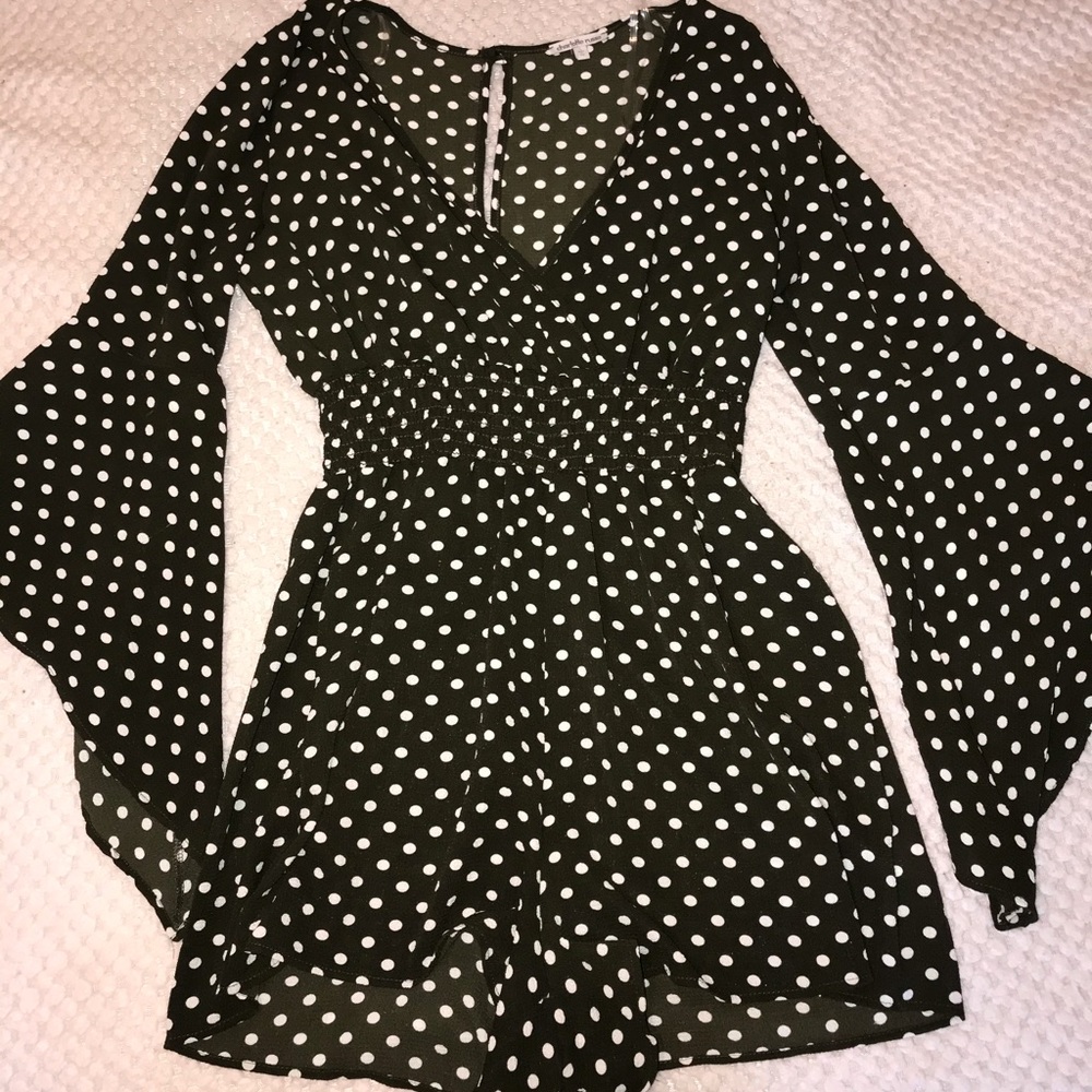 Green and white polka dot romper